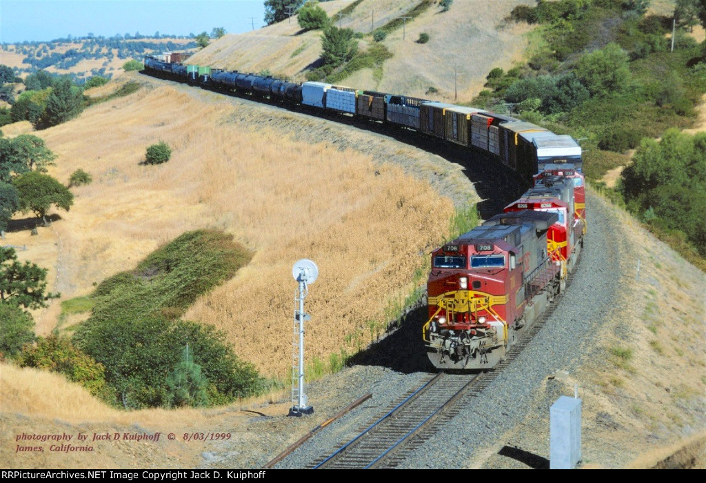 BNSF 708- 8266- 738, on the WP Feather River Route at James, California. August 3, 1999.  